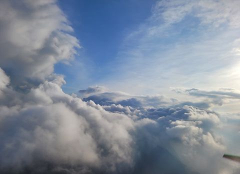 Towering clouds against a blue sky
